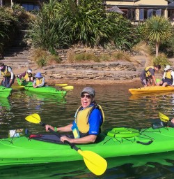 Couple kayaking at Marlborough Sounds, New Zealand