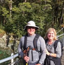 Couple at Routeburn track river, Otago New Zealand
