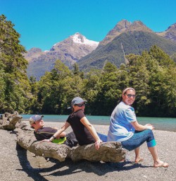 Group at Hollyford Track river, Fiordland New Zealand
