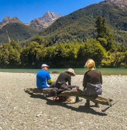 Group at Hollyford Track river, Fiordland New Zealand