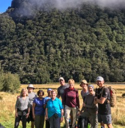 Group at Routeburn track valley, Fiordland New Zealand