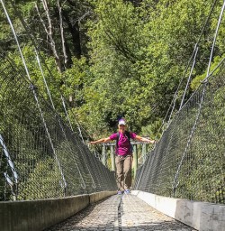 Guest on Routeburn Track River Bridge, Otago New Zealand