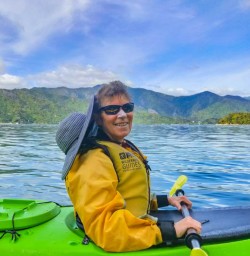Guest kayaking Queen Charlotte Sound