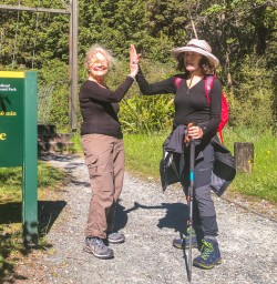 Happy ladies at Hollyford Track river, Fiordland New Zealand