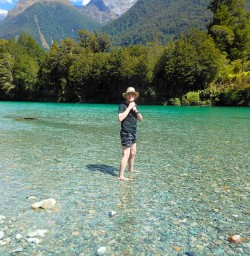 The clear waters of the Hollyford River make for a refreshing paddle