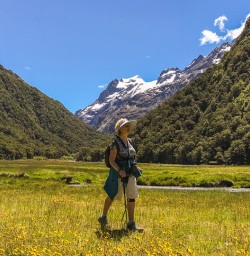 Lady walking at Routeburn track valley, Otago New Zealand