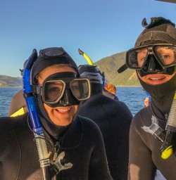 Couple ready to swim with dolphins at Kaikoura, Canterbury New Zealand