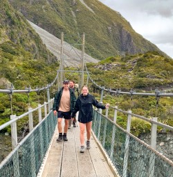 6. Guests crossing swing bridge Hooker Valley