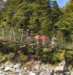6. Guests on swing bridge Hollyford