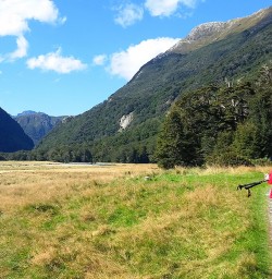 hiker enjoying view of routeburn valley