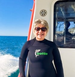 7. Solo guest on dolphin swim boat