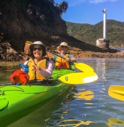 Couple kayaking the Marlborough Sounds, New Zealand