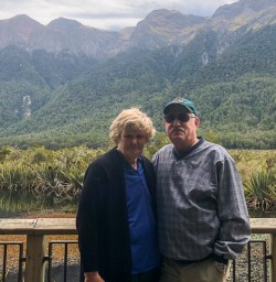 Couple at Mirror Lakes at Fiordland, New Zealand