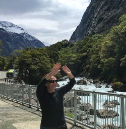 Guest enjoying river in Fiordland National Park