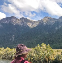 Lady at Mirror Lakes, Fiordland National Park Southland New Zealand