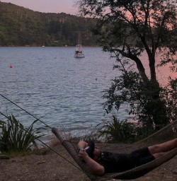 Sunset view from hammock at Lochmara Lodge, Marlborough Sounds New Zealand