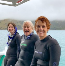 8. Happy guests on boat dolphin swim