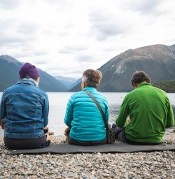 8. Three guests sat by Lake