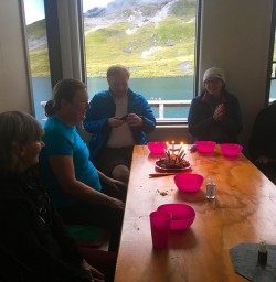 Cake in a back country hut next to an alpine tarn