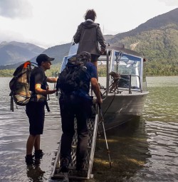 Boarding on jetboat at Hollyford river, Fiordland New Zealand