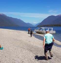 Boarding on jetboat at Hollyford river, Fiordland New Zealand