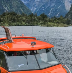 Taking boat at Arthur River, Milford Track Fiordland Southland New Zealand