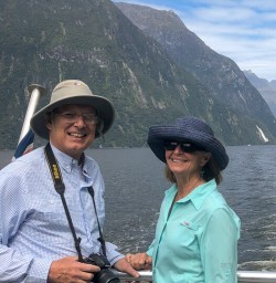 Couple on the boat at Milford Sound, Fiordland New Zealand