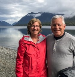 Couple at Hollyford river, Fiordland New Zealand
