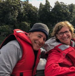 Couple on Jetboat at Hollyford river, Fiordland New Zealand