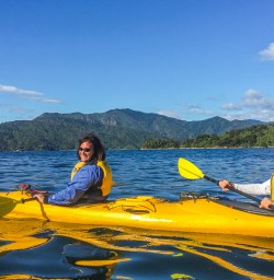 Couple Kayaking Marlborough Sounds, New Zealand