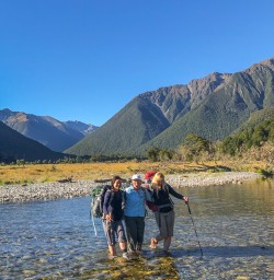 Crossing Travers river at Nelson Lakes National Park, Tasman New Zealand