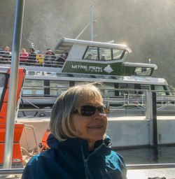 Guest on the boat at Arthur river, Fiordland New Zealand