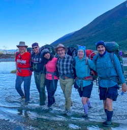 Guests crossing river Angelus Circuit