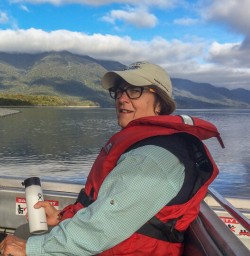 Guests on jetboat at Hollyford river, Fiordland New Zealand
