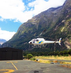 helicopter at milford sound new zealand