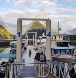 Taking boat at Milford Sound, Fiordland New Zealand