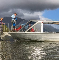 Taking Jetboat at Hollyford River, Fiordland National Park Southland New Zealand