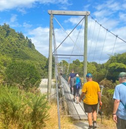 9. Group walking Pororari River Track