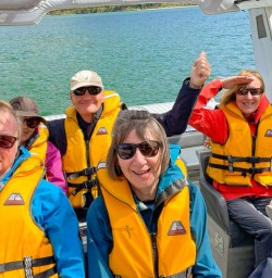 Guests on boat Hollyford