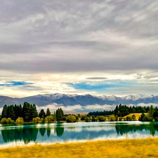 Driving past lake and Southern Alps