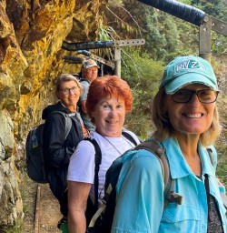 Guests exploring rockface in Karangahake Gorge 210125