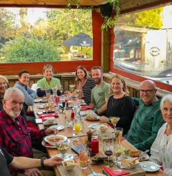 Guests enjoy a group dinner