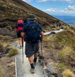 Man hiking Tongariro Crossing 03FEB25
