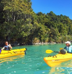 Kayaking under blue skies
