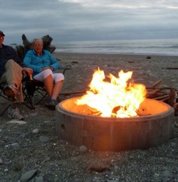 Hikers enjoying a Campfire at Punakaki Beach