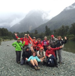 Happy hikers in the Hollyford Valley