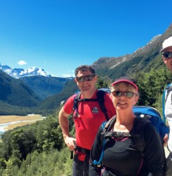 Hikers enjoying blue skies on the Routeburn Track