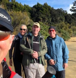 Stewart Island guests on beach Ulva Island GW25OCT26