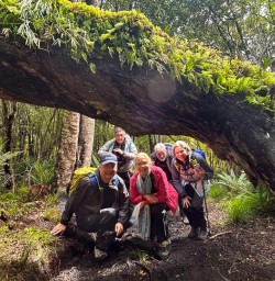 Ulva Island guests with tree GW25OCT26
