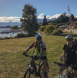 Couple biking at Lake Wanaka, Otago New Zealand